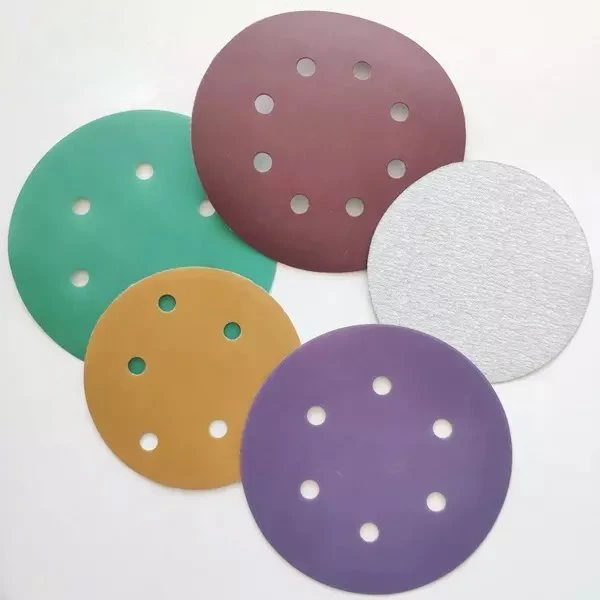 Hook and loop sanding disc 
